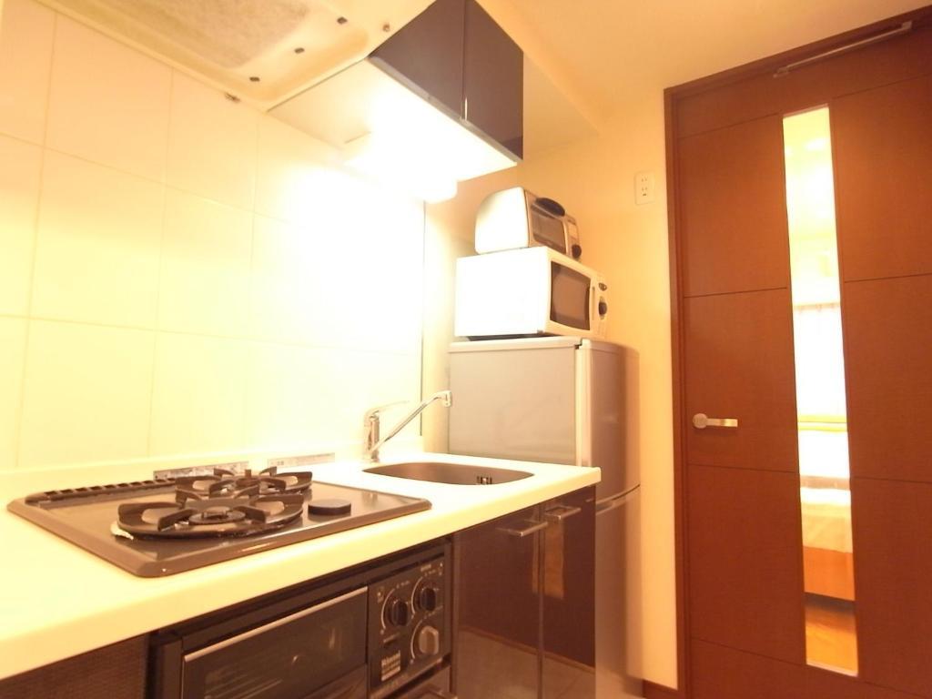 Palace Studio Shinjuku Tochomae طوكيو الغرفة الصورة